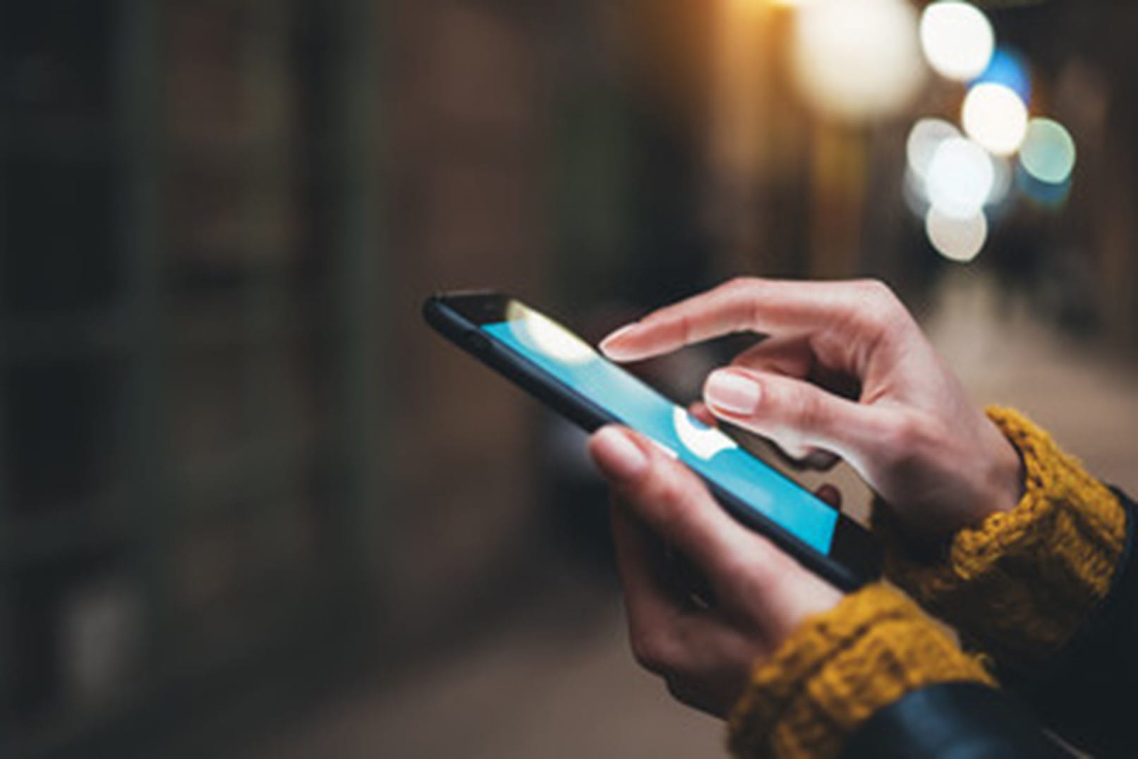 Person using Smartphone with Touchscreen